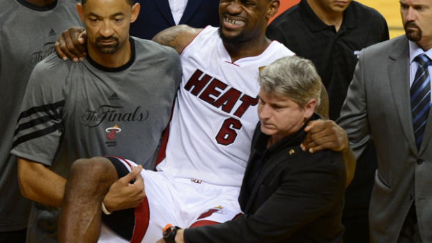 Injured LeBron James of the Miami Heat i