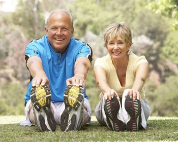 elderly-couple-stretching